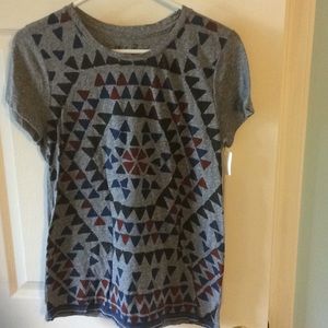 Grey t-shirt with triangles.